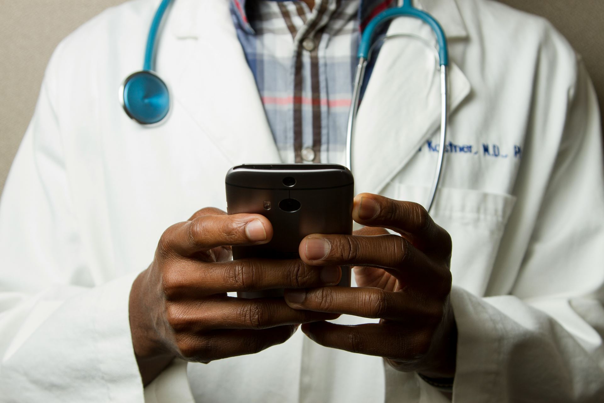 Doctor holding a mobile